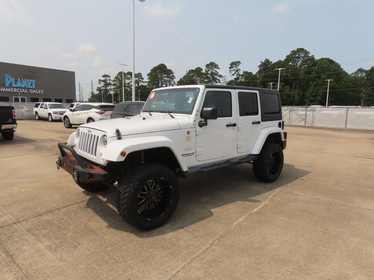 2014 Jeep Wrangler Unlimited Sahara Bright White Clearcoat at Planet Ford