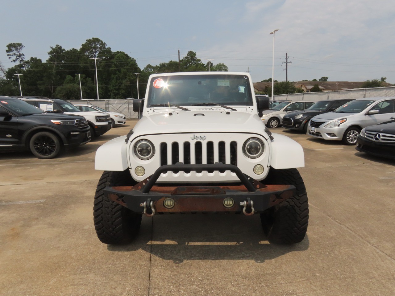 2014 Jeep Wrangler Unlimited Sahara Bright White Clearcoat at Planet Ford