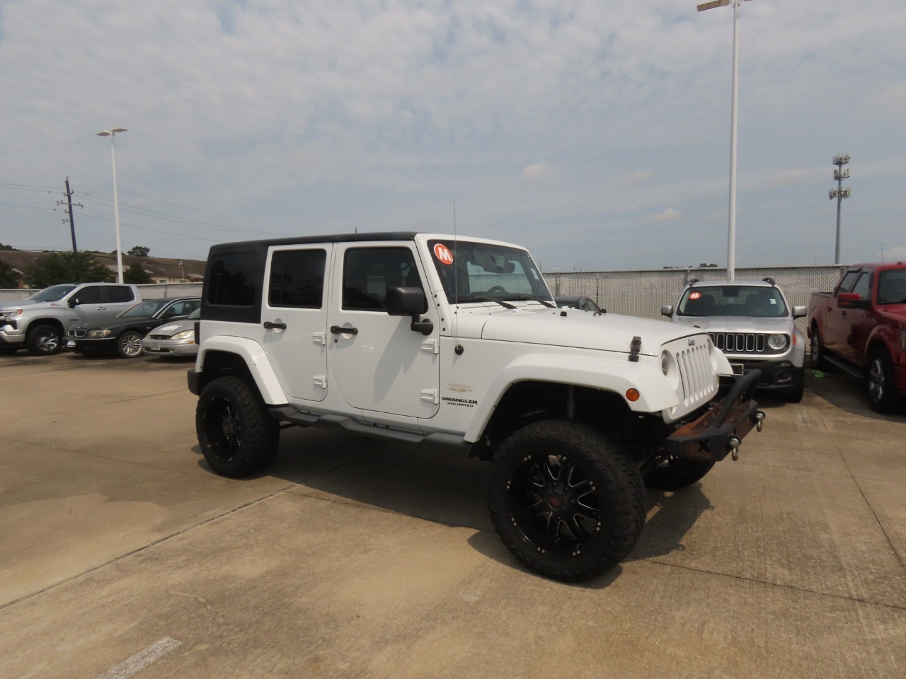 2014 Jeep Wrangler Unlimited Sahara Bright White Clearcoat at Planet Ford