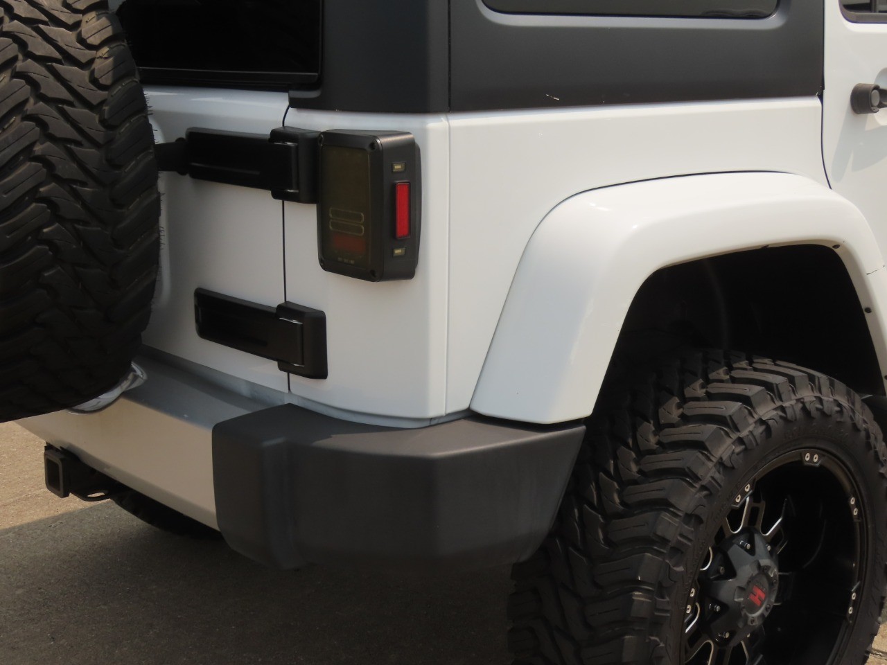 2014 Jeep Wrangler Unlimited Sahara Bright White Clearcoat at Planet Ford