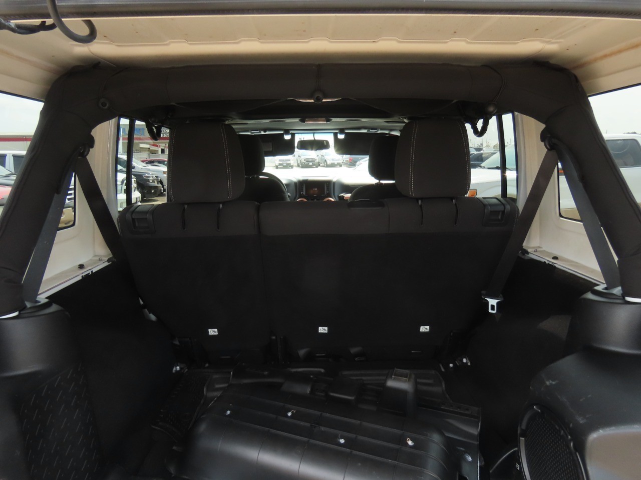 2014 Jeep Wrangler Unlimited Sahara Bright White Clearcoat at Planet Ford