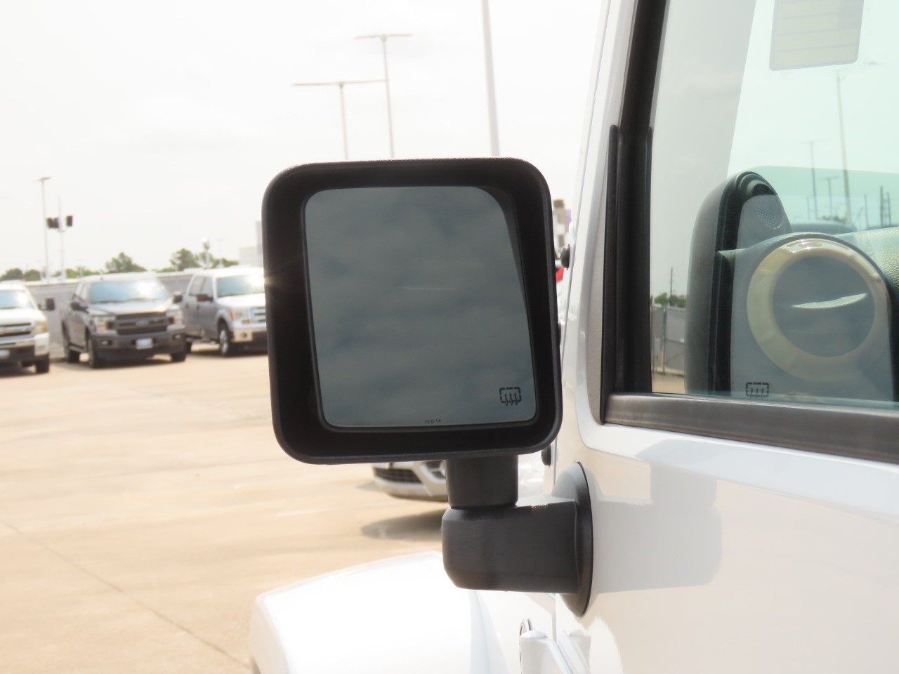 2014 Jeep Wrangler Unlimited Sahara Bright White Clearcoat at Planet Ford