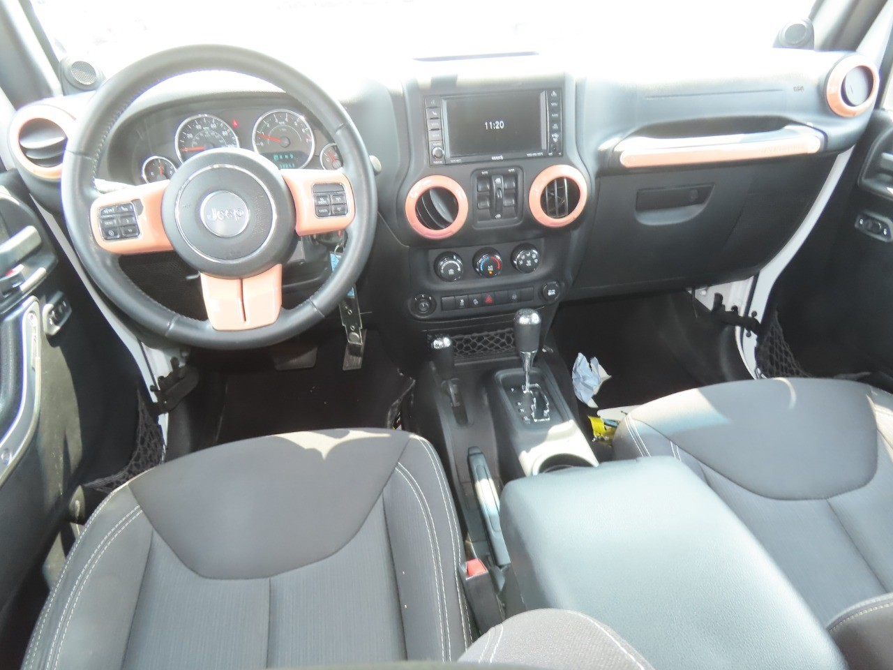 2014 Jeep Wrangler Unlimited Sahara Bright White Clearcoat at Planet Ford