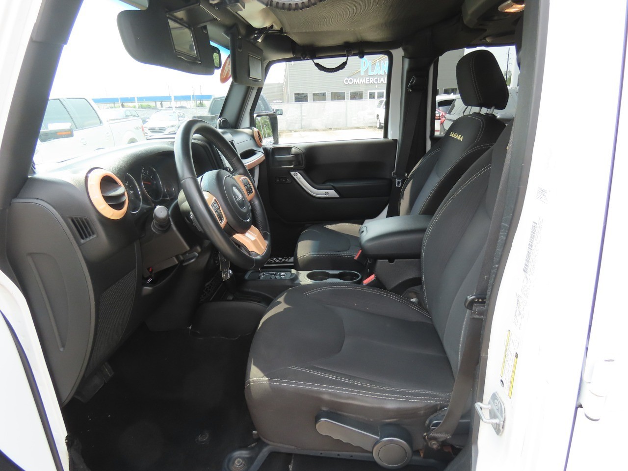 2014 Jeep Wrangler Unlimited Sahara Bright White Clearcoat at Planet Ford