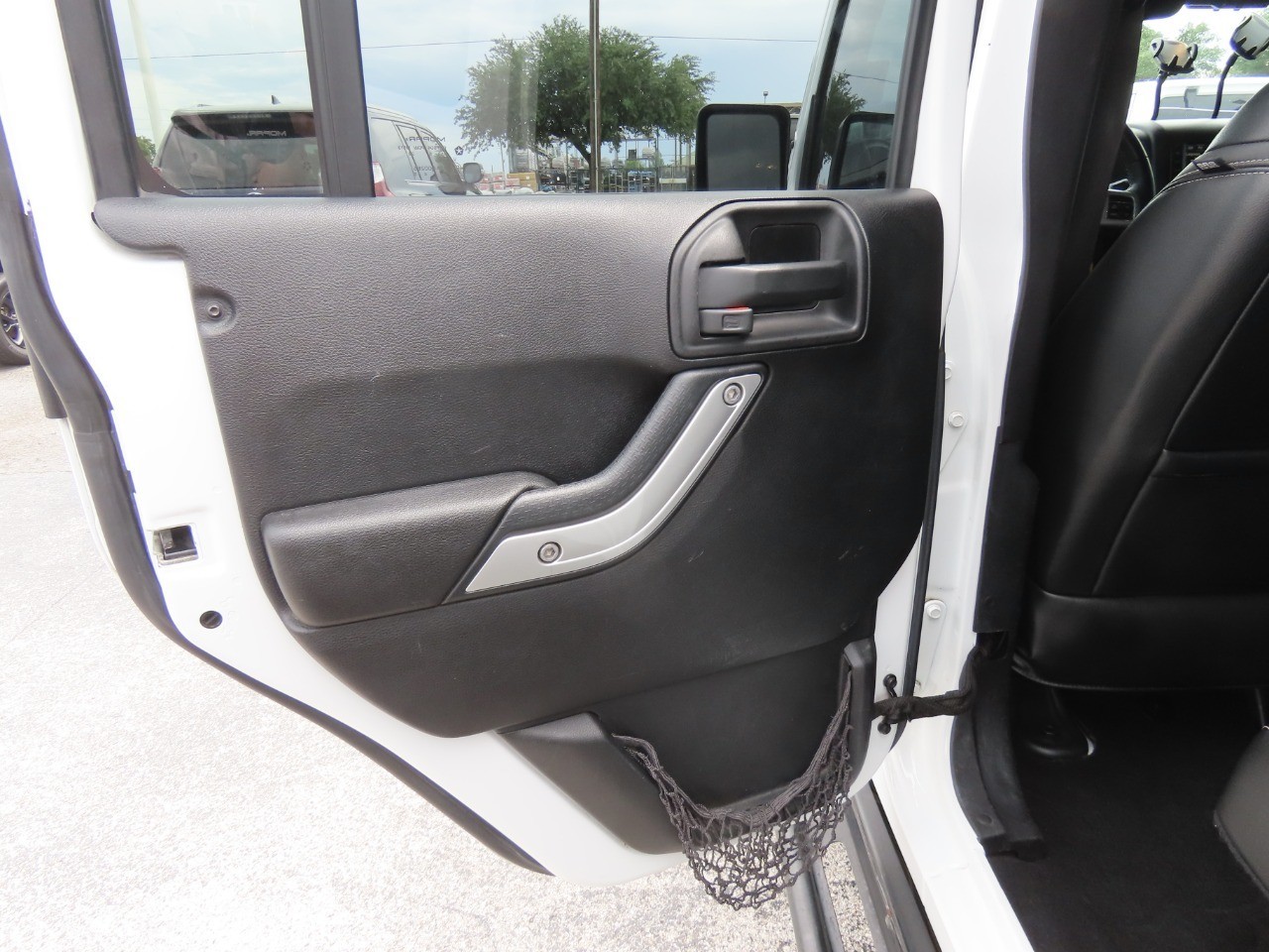 used 2016 Jeep Wrangler Unlimited car, priced at $19,999
