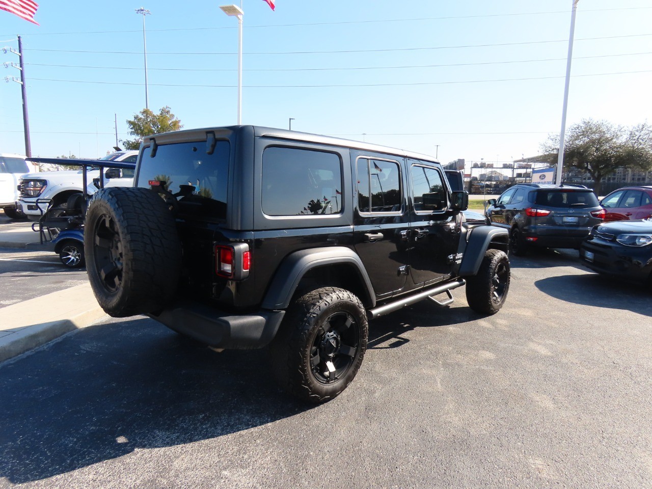 2019 Jeep Wrangler Unlimited Sport S Black Clearcoat at Planet Ford