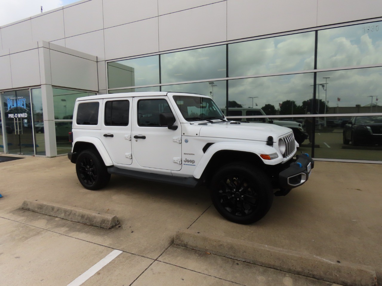 used 2024 Jeep Wrangler 4xe car, priced at $31,999
