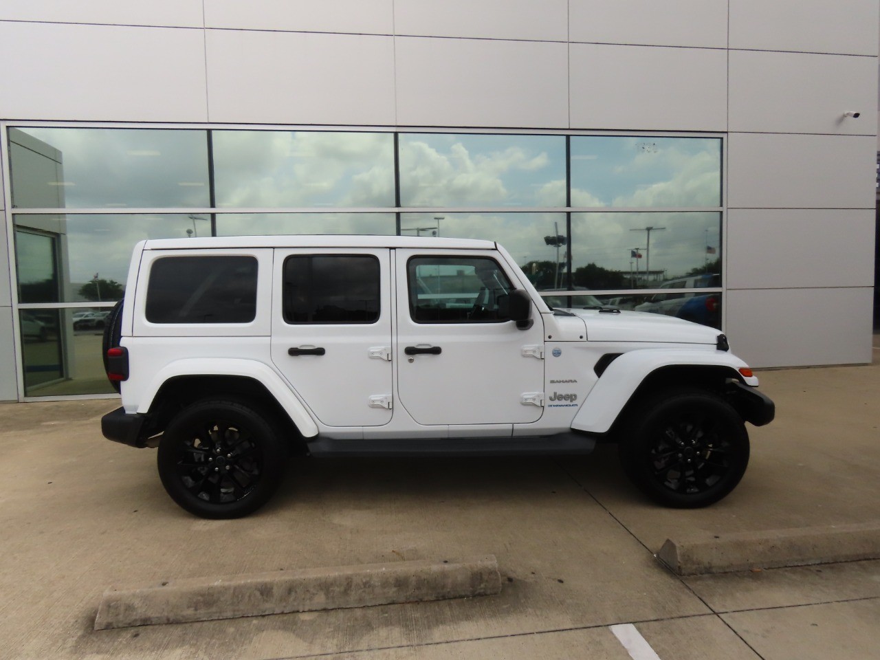used 2024 Jeep Wrangler 4xe car, priced at $31,999