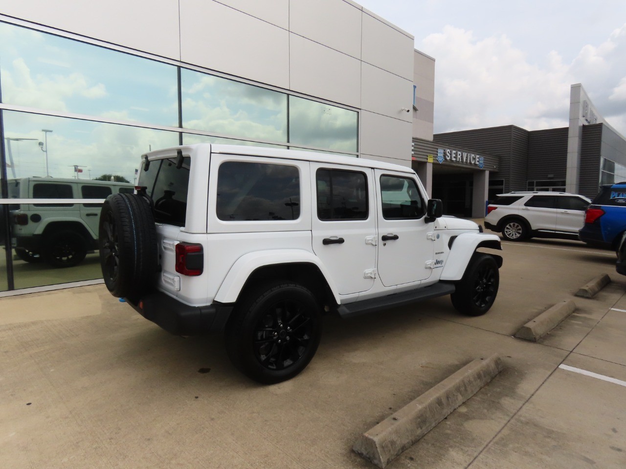 used 2024 Jeep Wrangler 4xe car, priced at $31,999