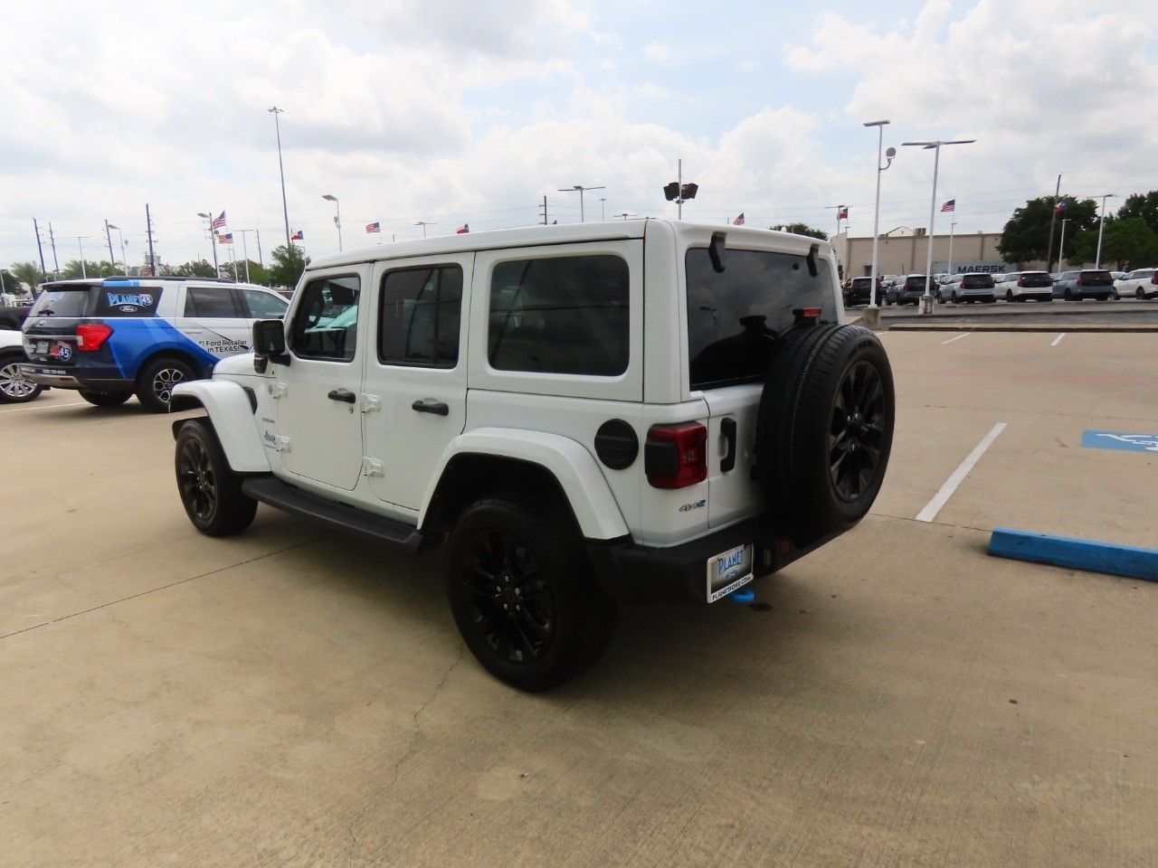 used 2024 Jeep Wrangler 4xe car, priced at $31,999
