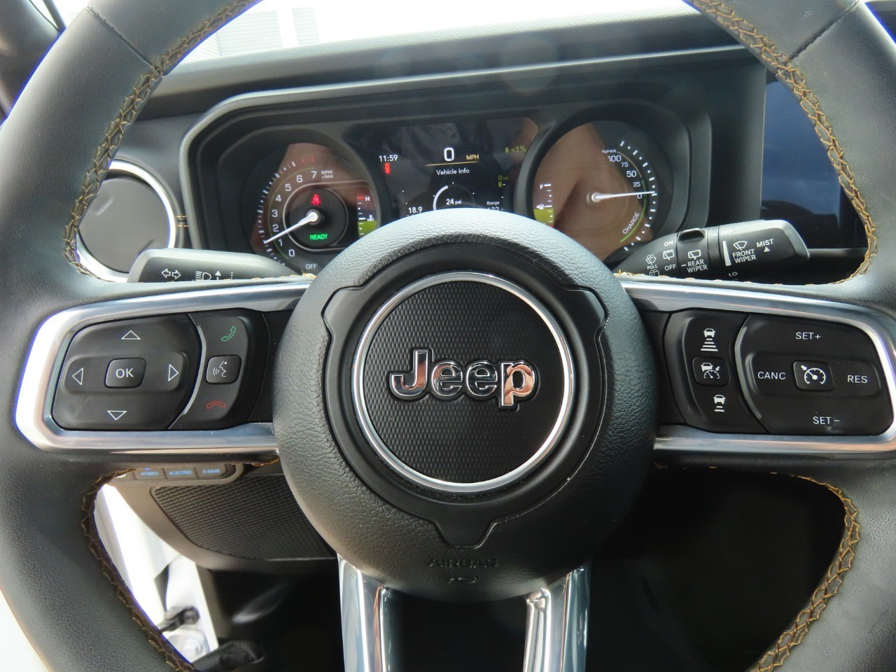 used 2024 Jeep Wrangler 4xe car, priced at $31,999