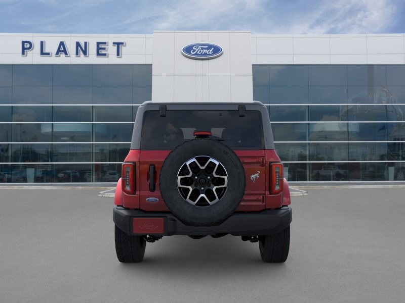 2026 Ford Bronco Outer Banks Ruby Red Metallic Tinted Clearcoat at Planet Ford