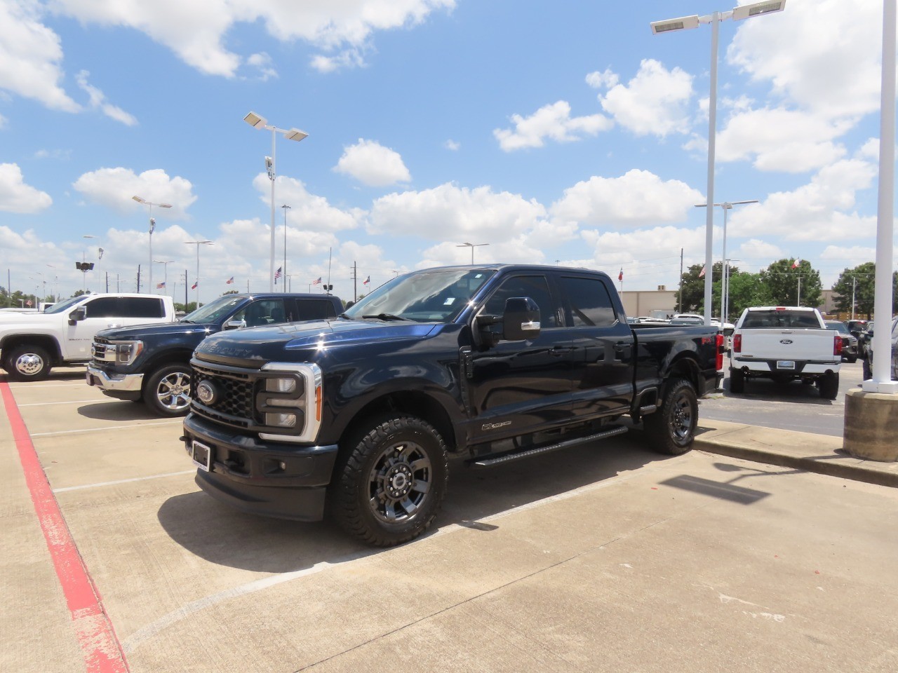 2023 Ford Super Duty F-250 SRW LARIAT Antimatter Blue Metallic at Planet Ford