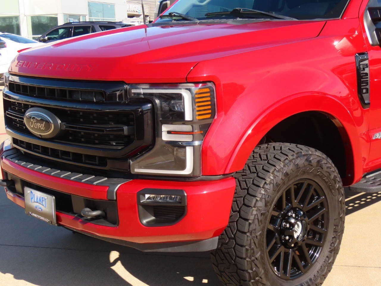 2021 Ford Super Duty F-250 SRW LARIAT Rapid Red Metallic Tinted Clearcoat at Planet Ford