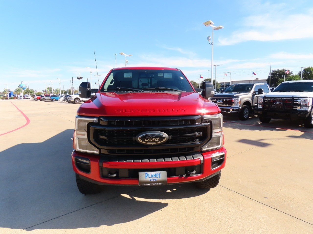 2021 Ford Super Duty F-250 SRW LARIAT Rapid Red Metallic Tinted Clearcoat at Planet Ford