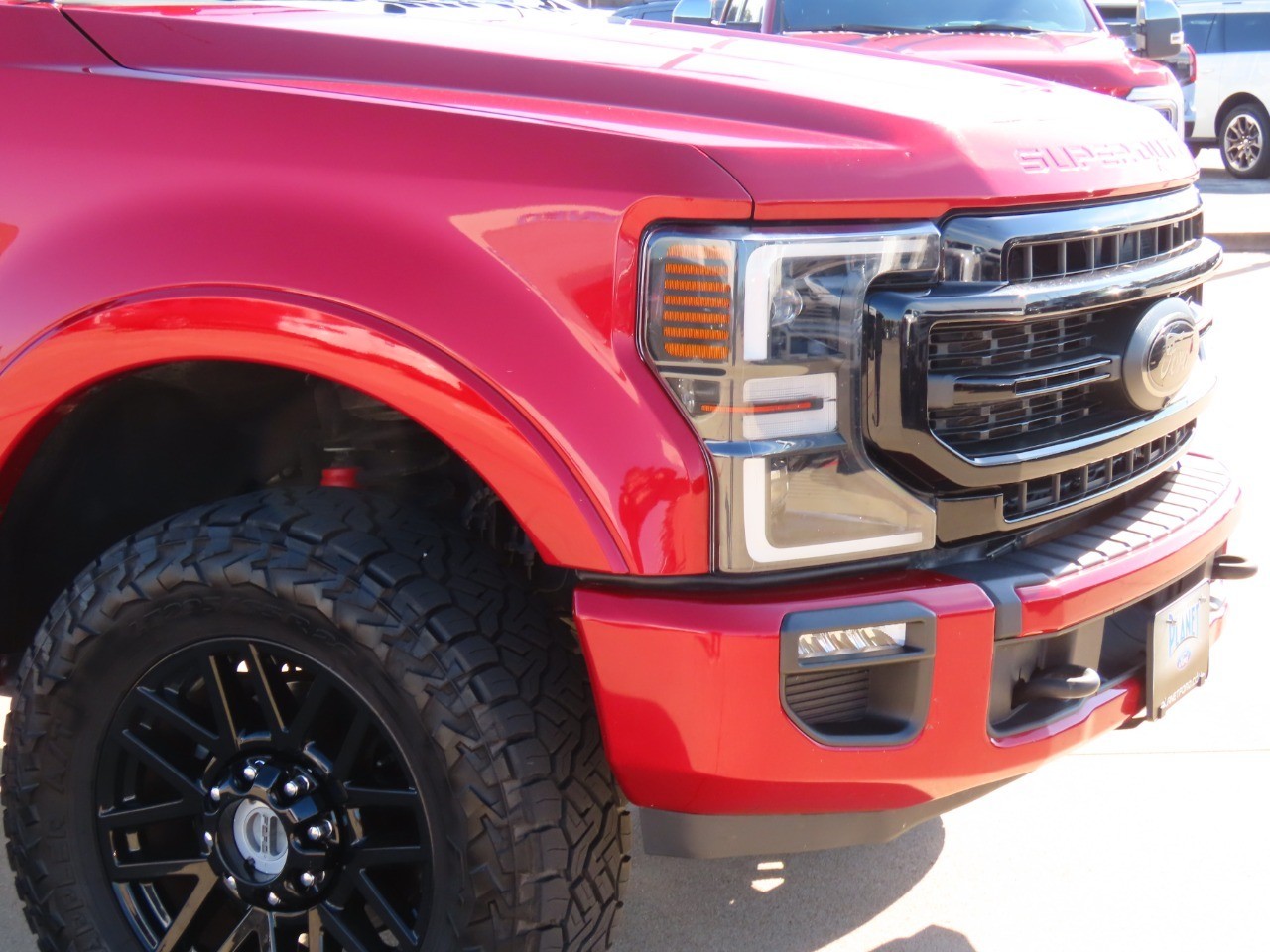 2021 Ford Super Duty F-250 SRW LARIAT Rapid Red Metallic Tinted Clearcoat at Planet Ford