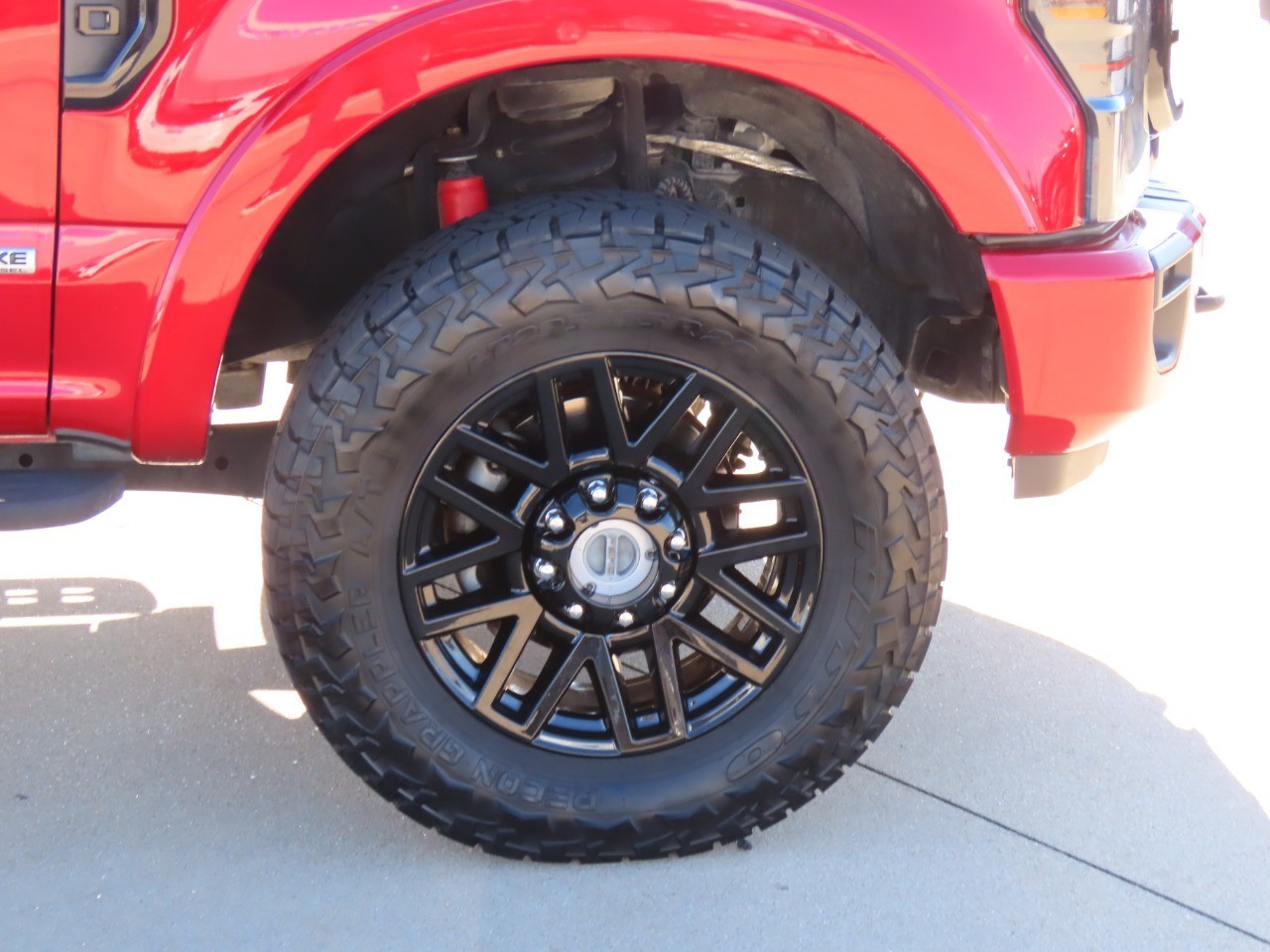 2021 Ford Super Duty F-250 SRW LARIAT Rapid Red Metallic Tinted Clearcoat at Planet Ford