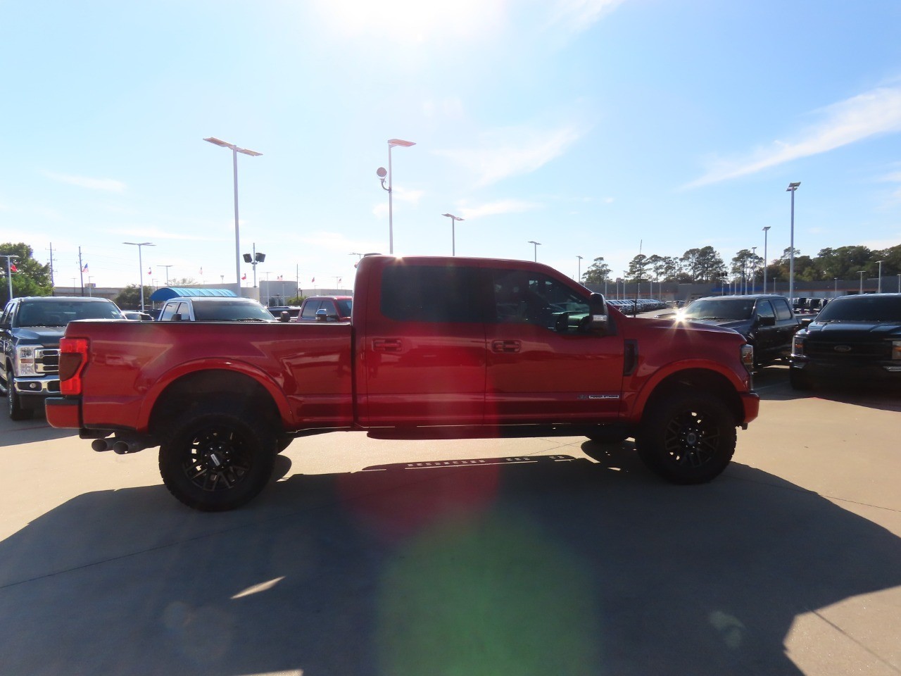 2021 Ford Super Duty F-250 SRW LARIAT Rapid Red Metallic Tinted Clearcoat at Planet Ford