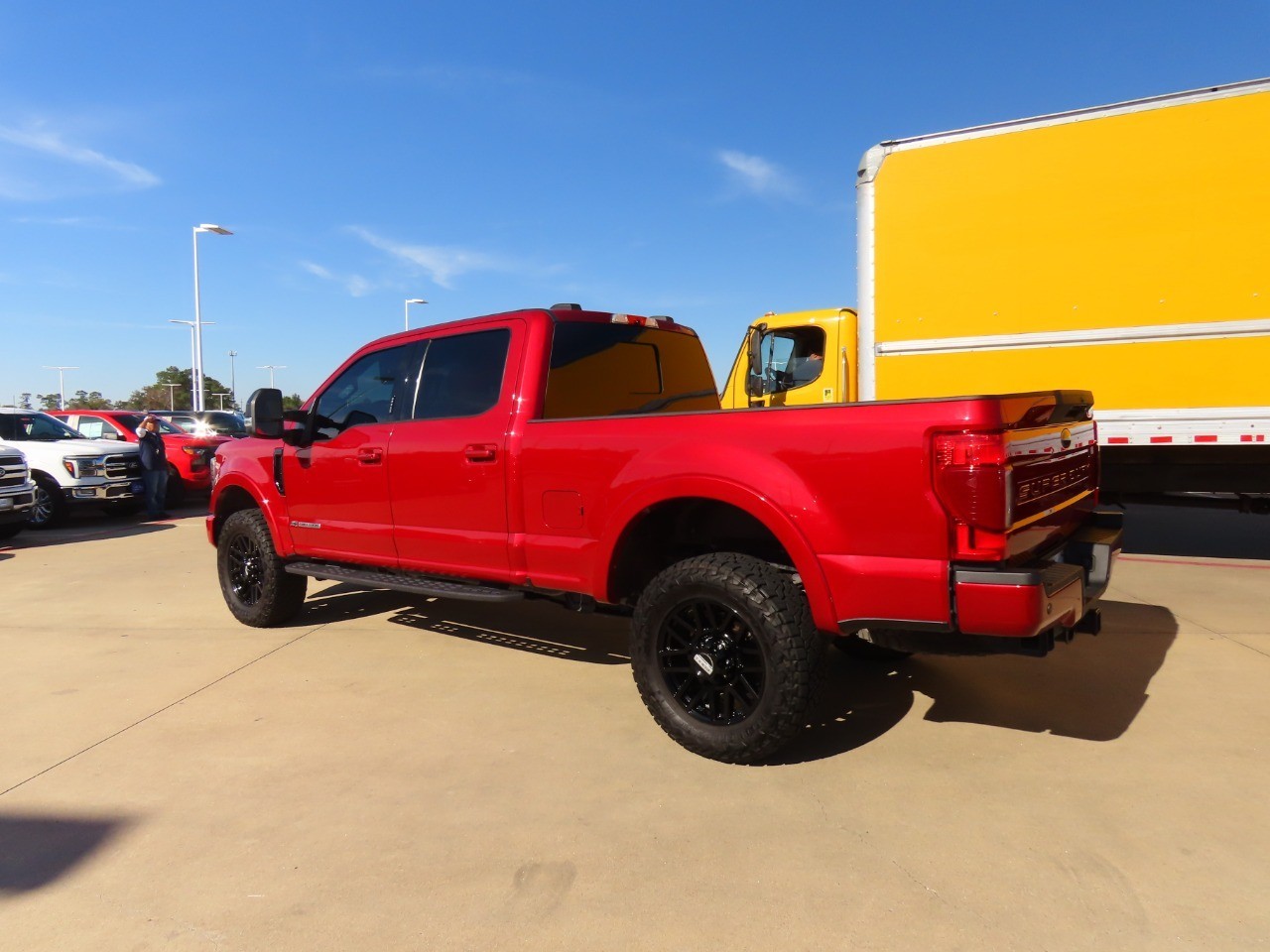 2021 Ford Super Duty F-250 SRW LARIAT Rapid Red Metallic Tinted Clearcoat at Planet Ford