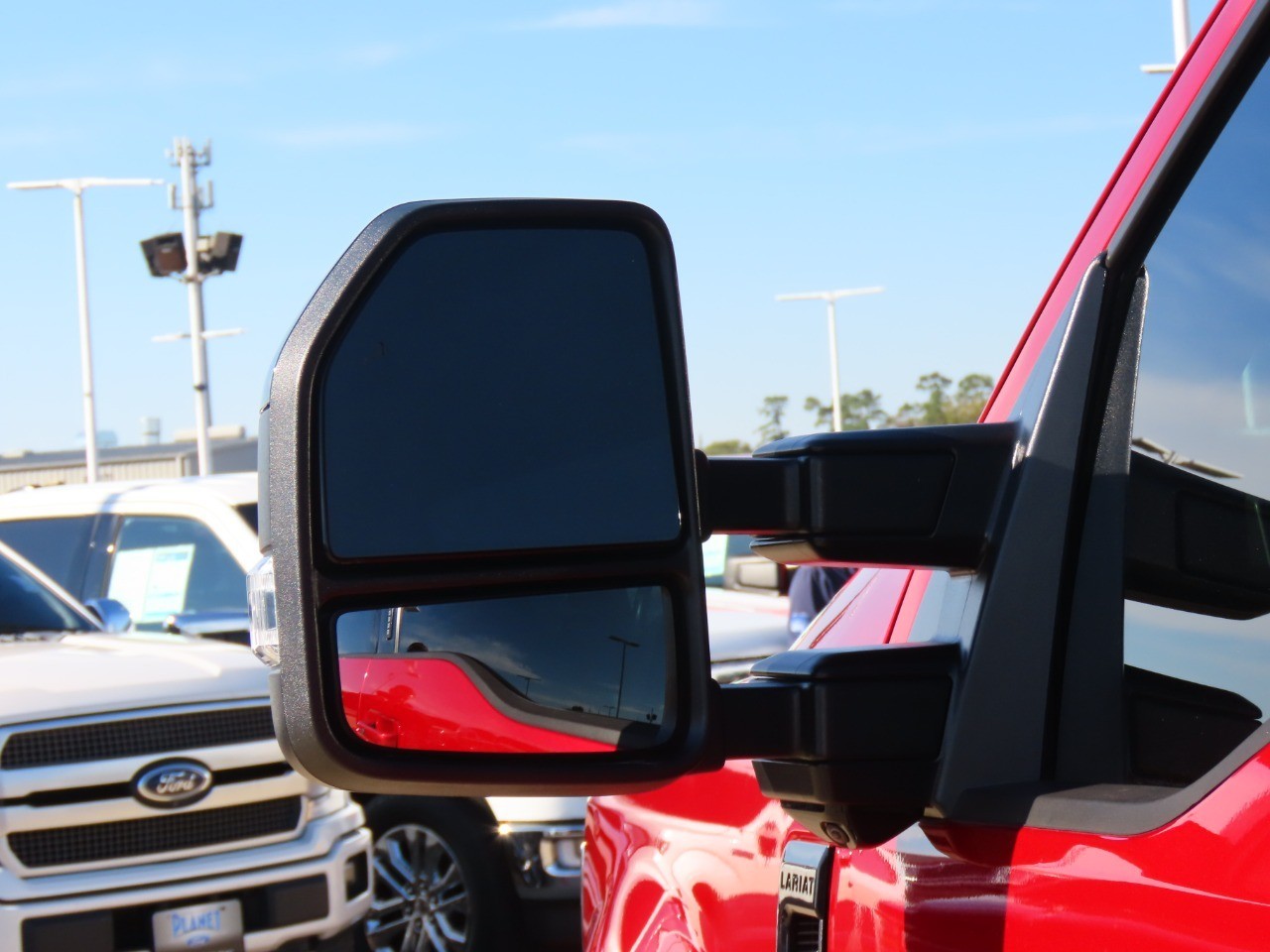 2021 Ford Super Duty F-250 SRW LARIAT Rapid Red Metallic Tinted Clearcoat at Planet Ford