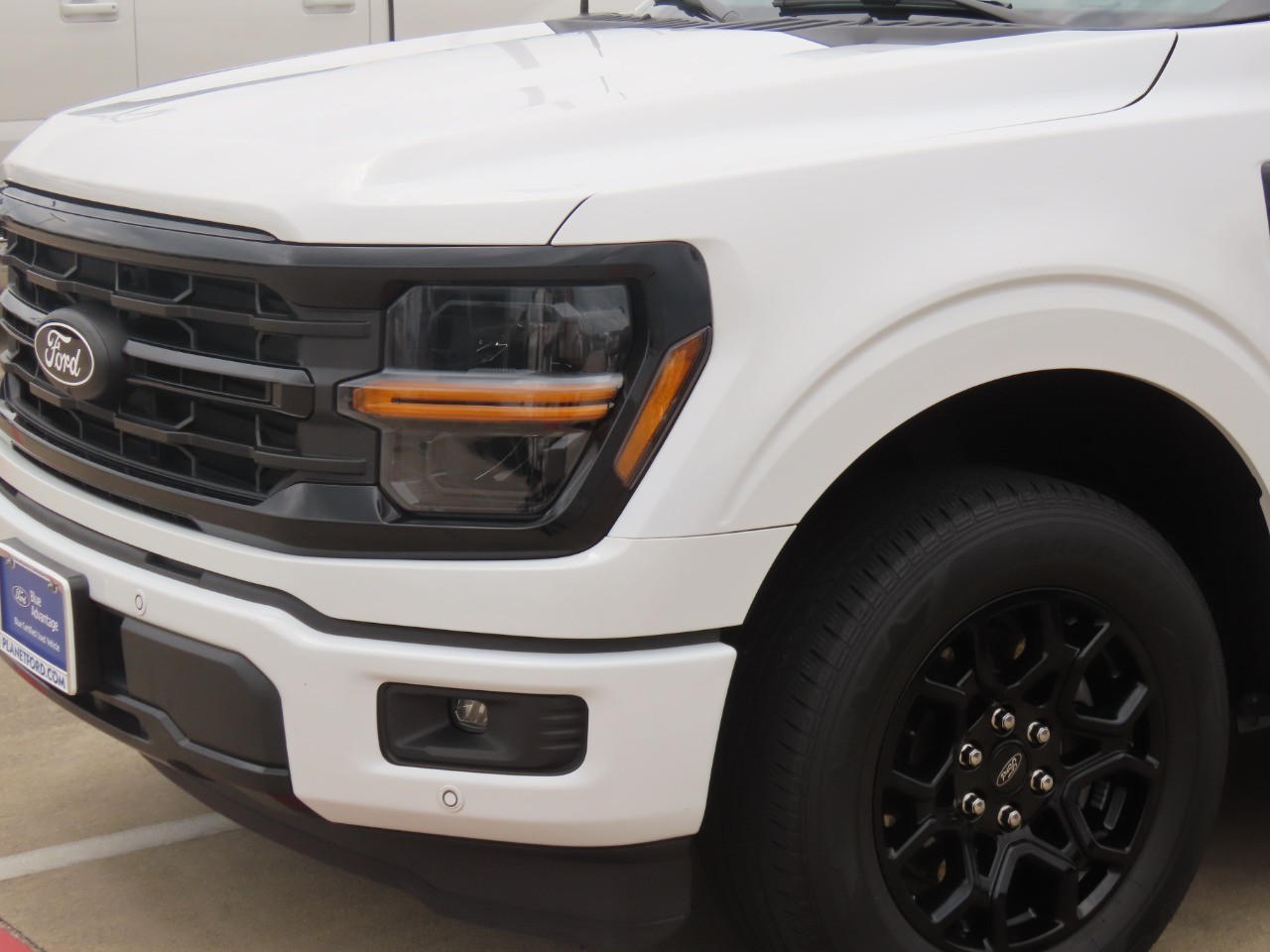 2024 Ford F-150 XLT Oxford White at Planet Ford