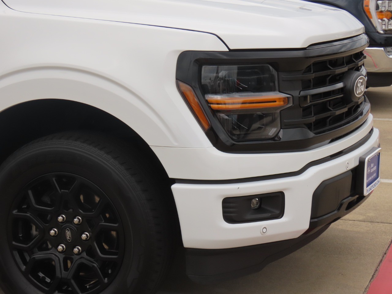 2024 Ford F-150 XLT Oxford White at Planet Ford