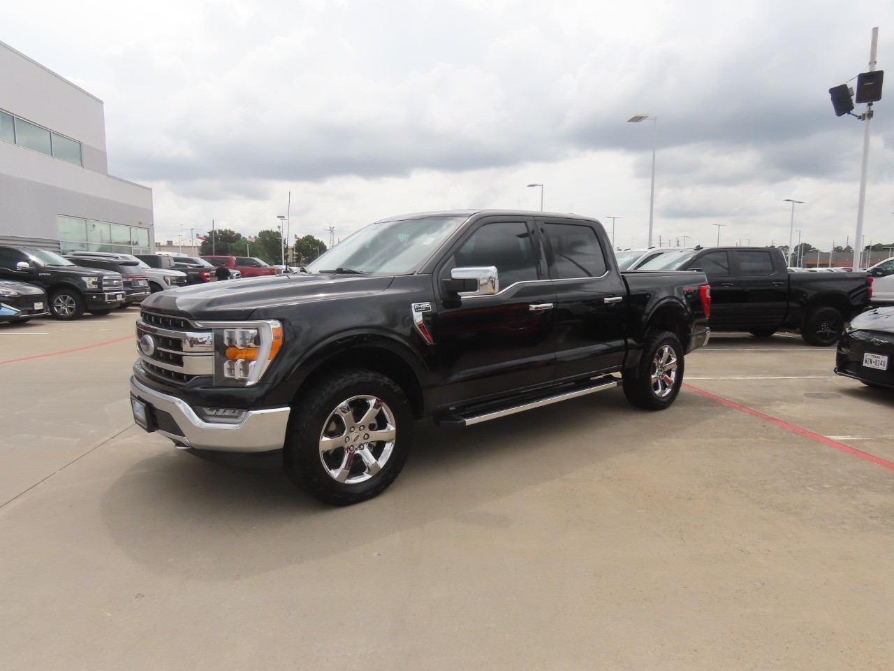 2023 Ford F-150 LARIAT Agate Black Metallic at Planet Ford