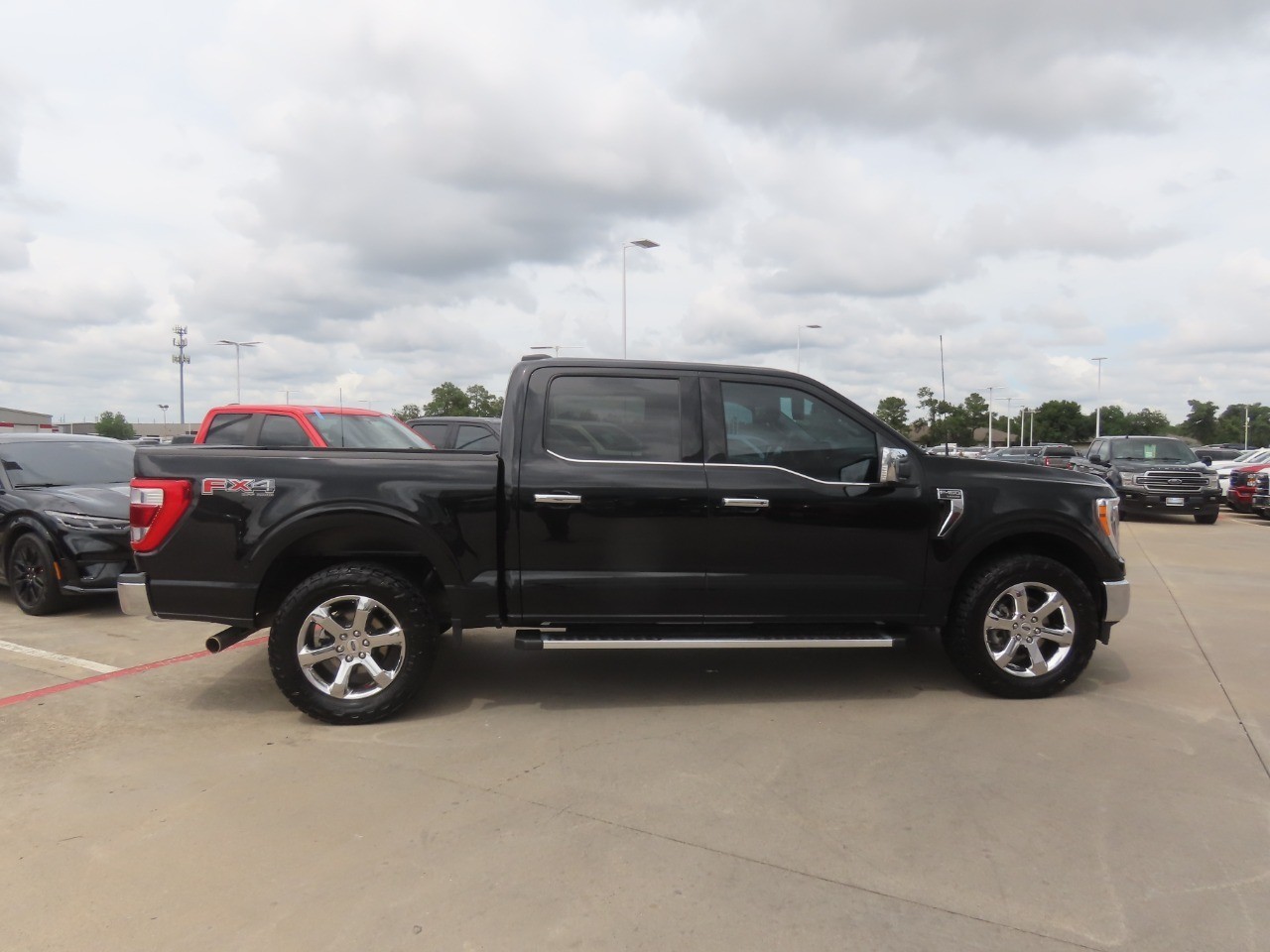 2023 Ford F-150 LARIAT Agate Black Metallic at Planet Ford