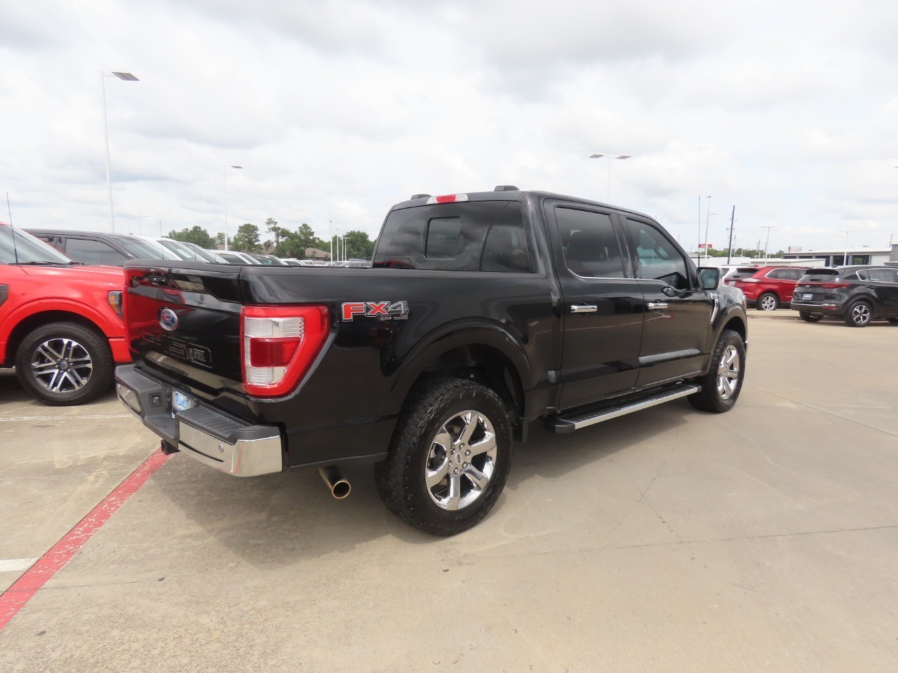 2023 Ford F-150 LARIAT Agate Black Metallic at Planet Ford