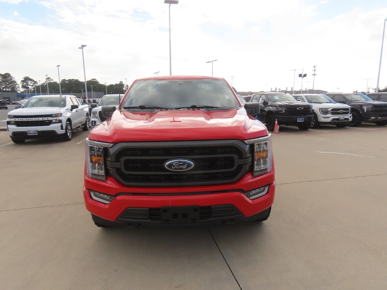 2022 Ford F-150 LARIAT Race Red at Planet Ford