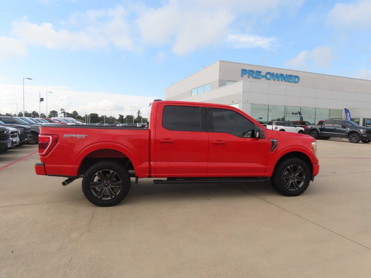 2022 Ford F-150 LARIAT Race Red at Planet Ford