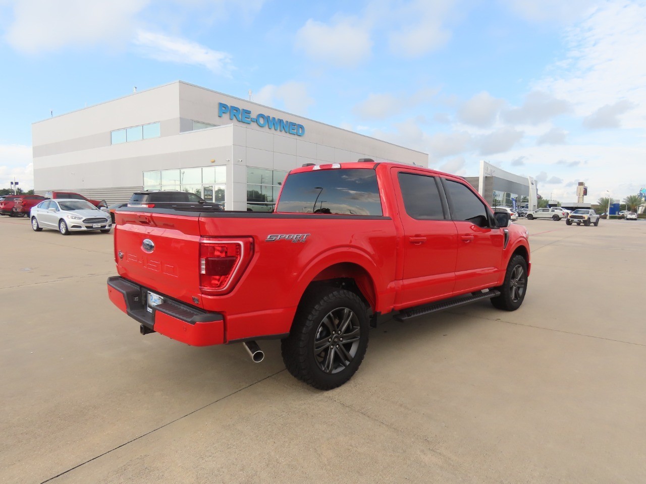 2022 Ford F-150 LARIAT Race Red at Planet Ford