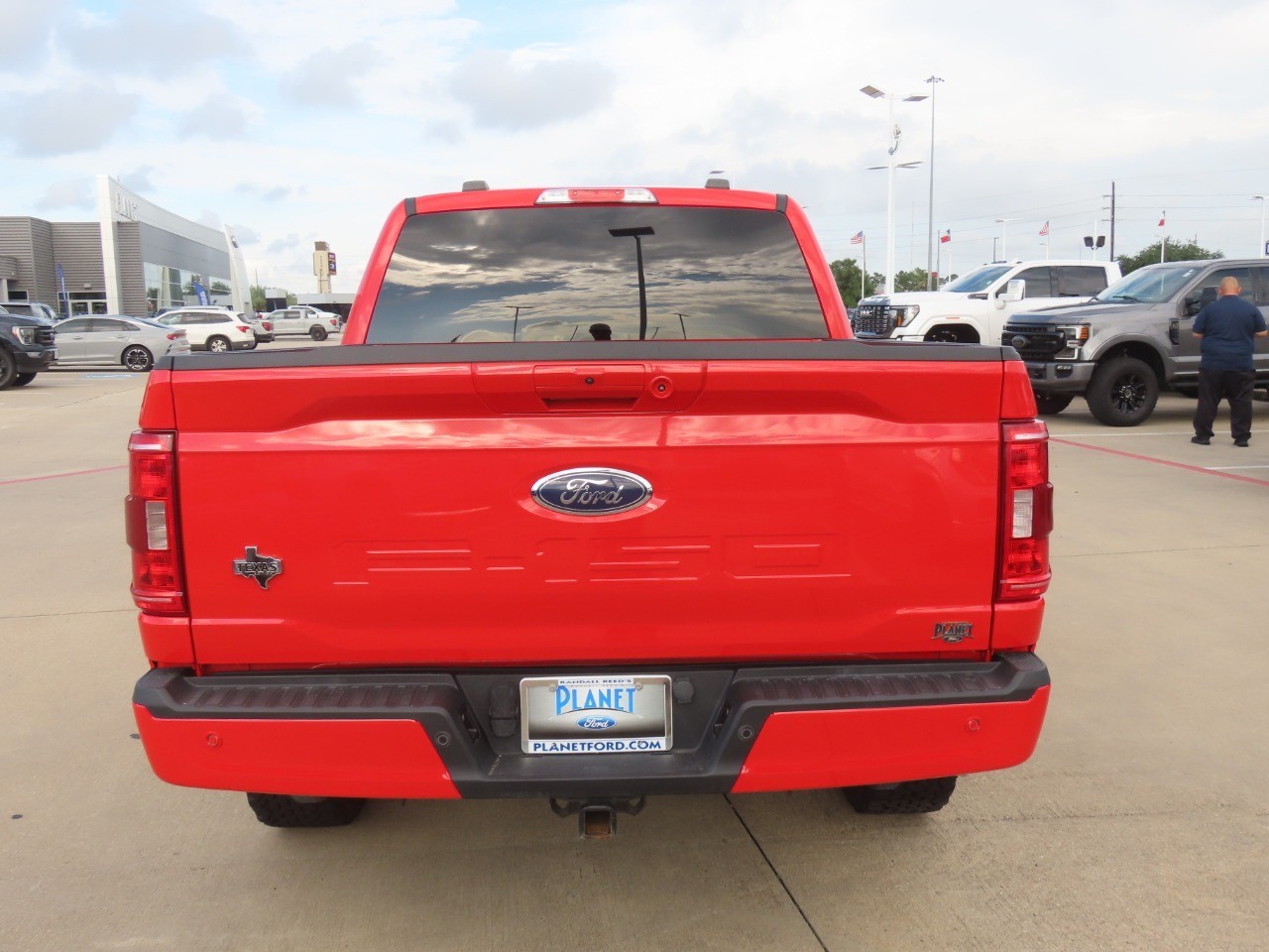 2022 Ford F-150 LARIAT Race Red at Planet Ford