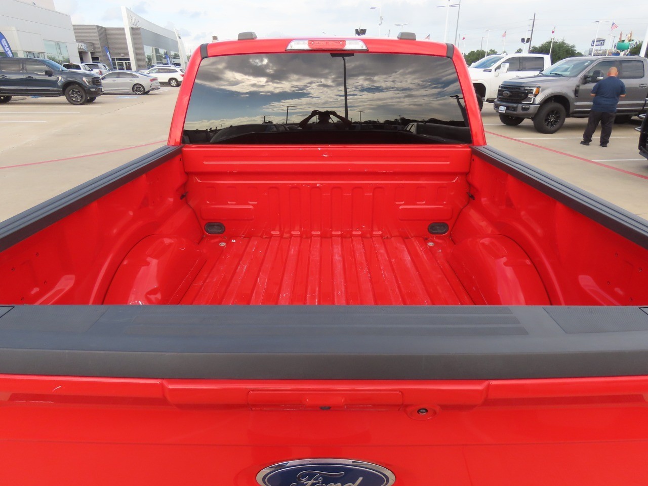 2022 Ford F-150 LARIAT Race Red at Planet Ford