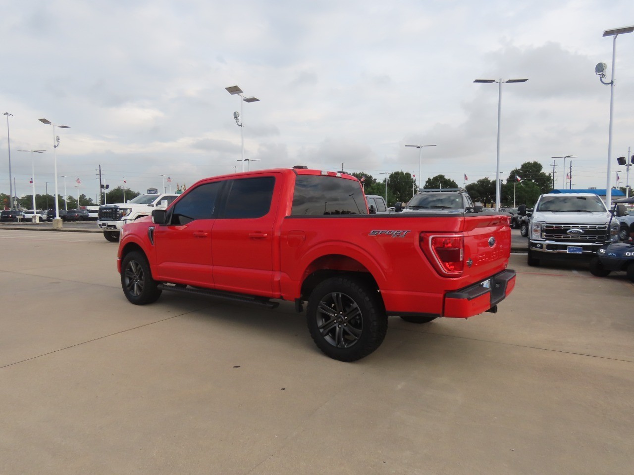 2022 Ford F-150 LARIAT Race Red at Planet Ford