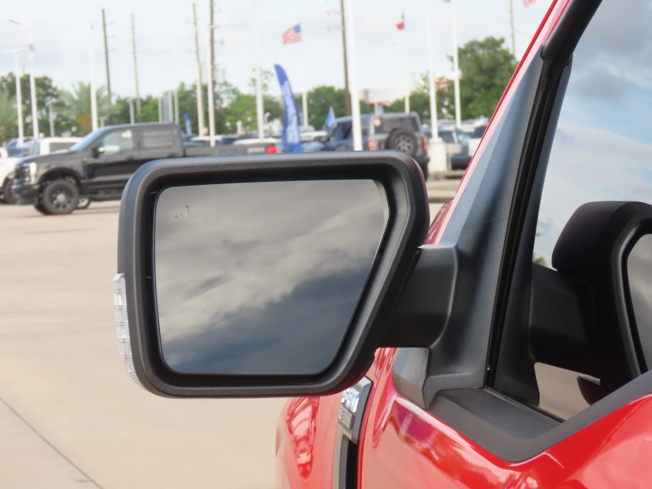 2022 Ford F-150 LARIAT Race Red at Planet Ford