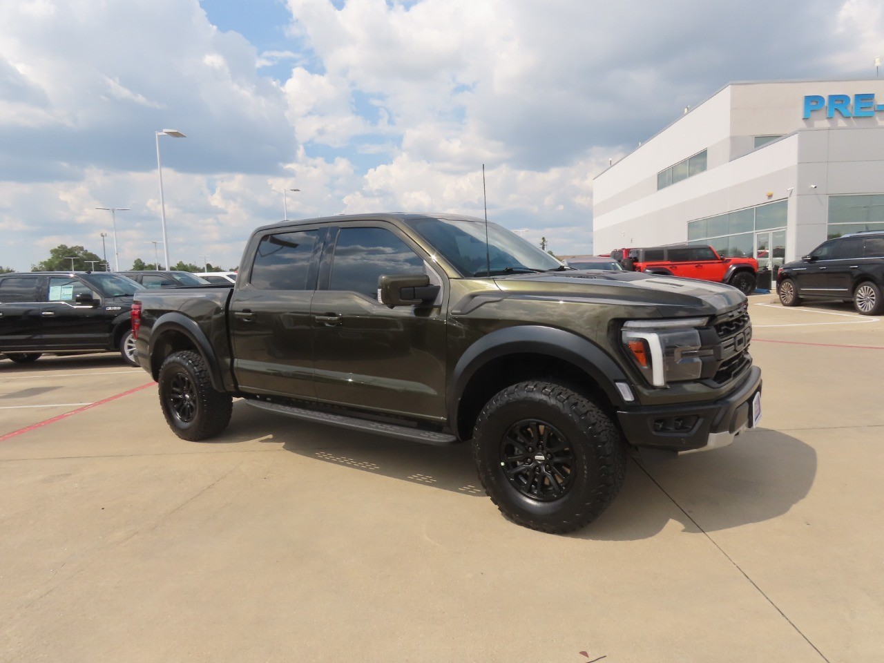 2025 Ford F-150 Raptor Shelter Green at Planet Ford