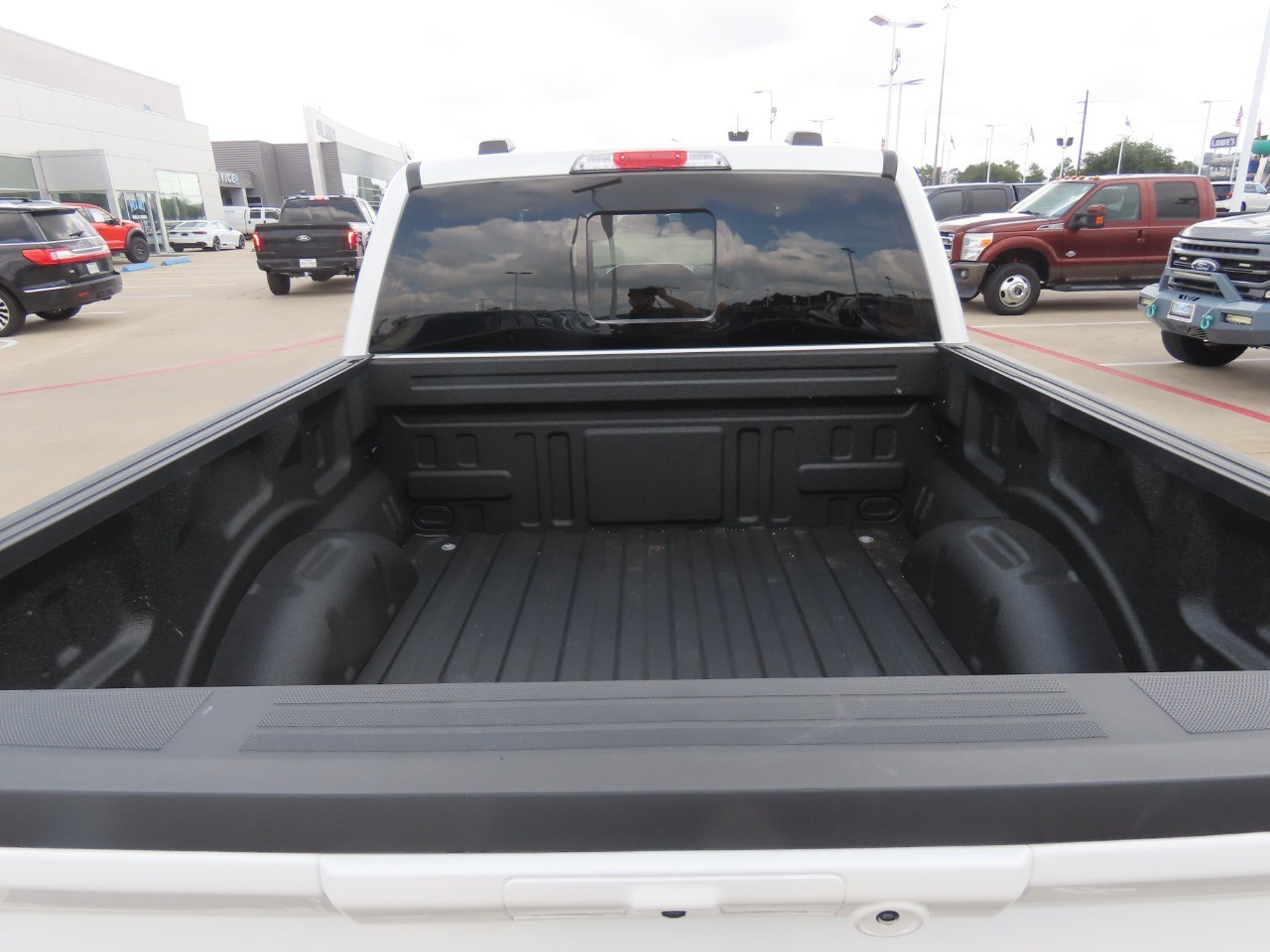 2026 Ford F-150 LARIAT Star White Metallic Tri-Coat at Planet Ford