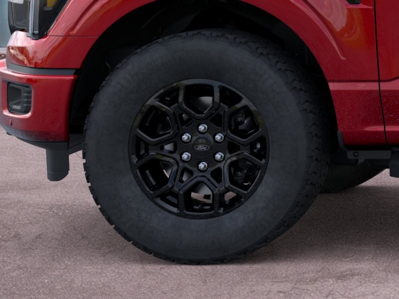 2026 Ford F-150 LARIAT Ruby Red Metallic Tinted Clearcoat at Planet Ford