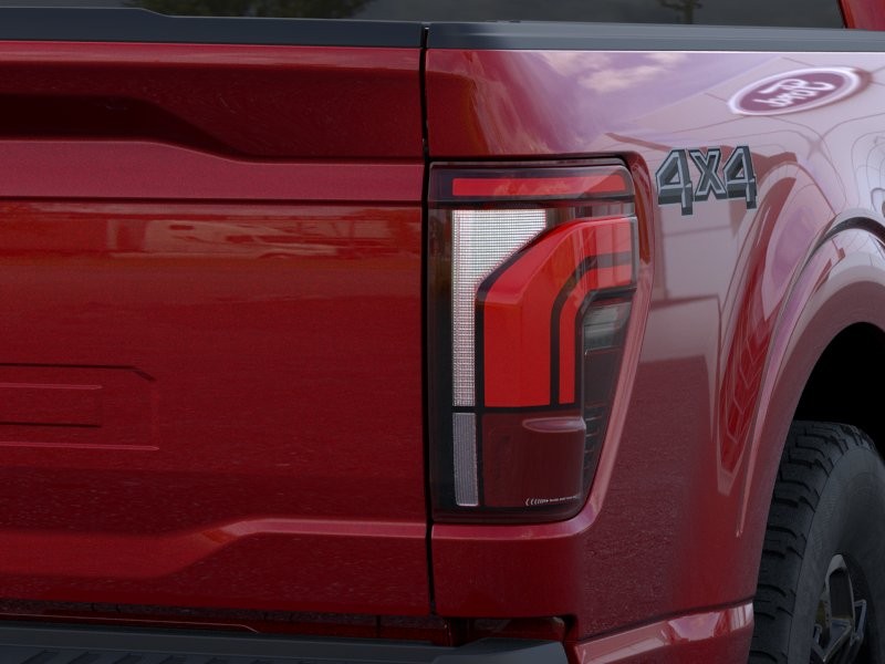 2026 Ford F-150 LARIAT Ruby Red Metallic Tinted Clearcoat at Planet Ford