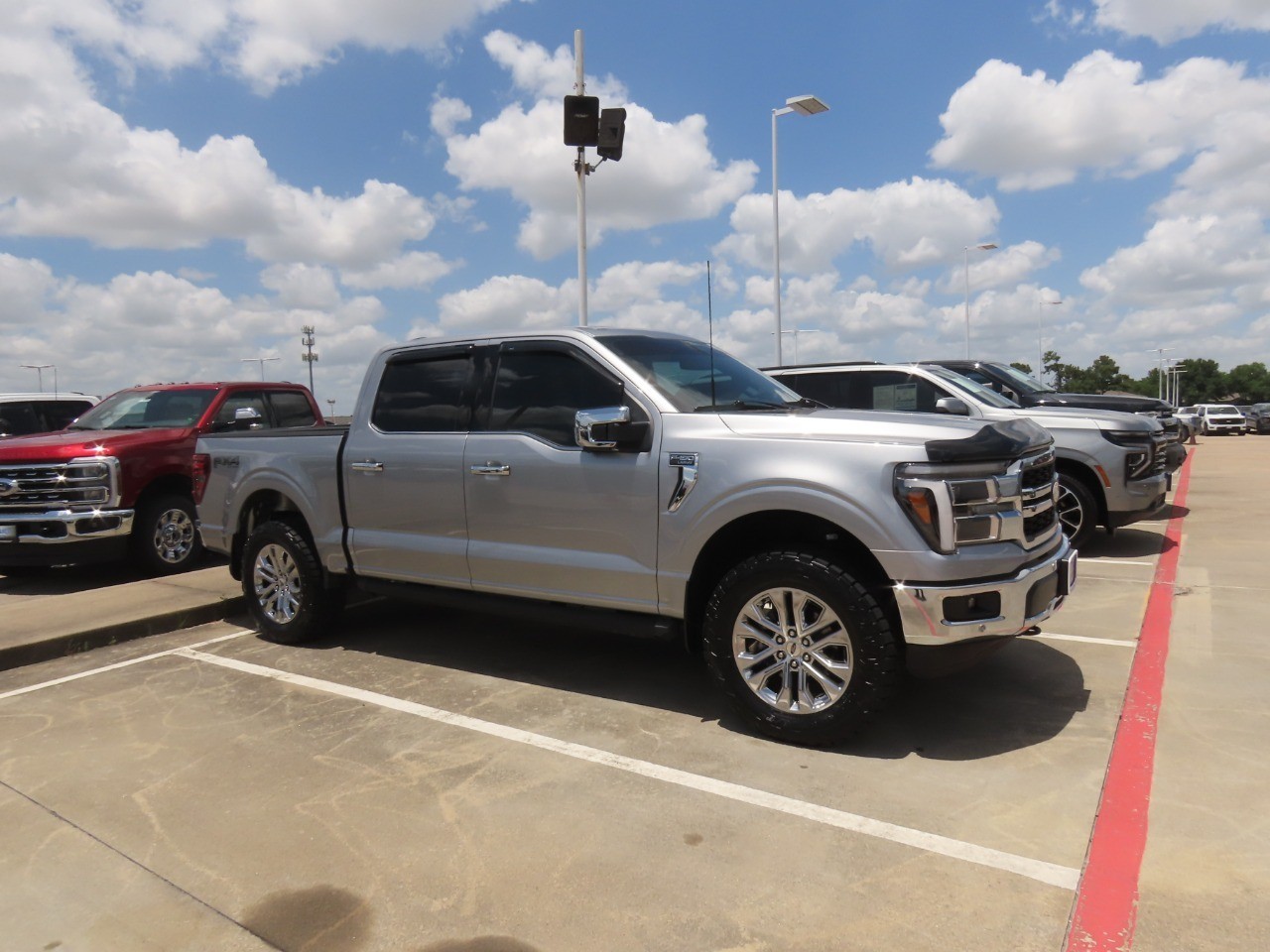 2025 Ford F-150 LARIAT Iconic Silver Metallic at Planet Ford