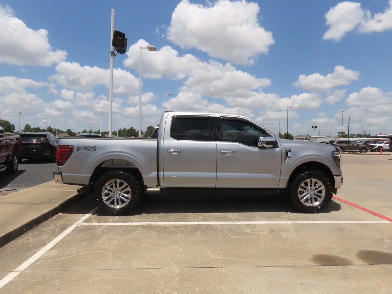 2025 Ford F-150 LARIAT Iconic Silver Metallic at Planet Ford