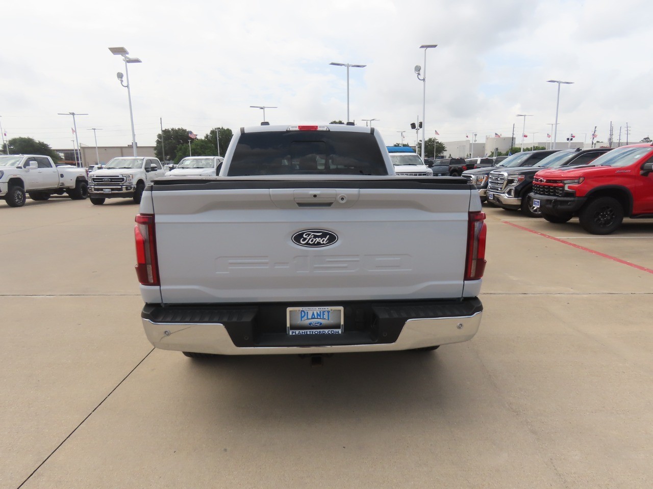2025 Ford F-150 LARIAT Space White Metallic at Planet Ford