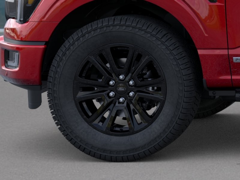 2026 Ford F-150 Platinum Ruby Red Metallic Tinted Clearcoat at Planet Ford