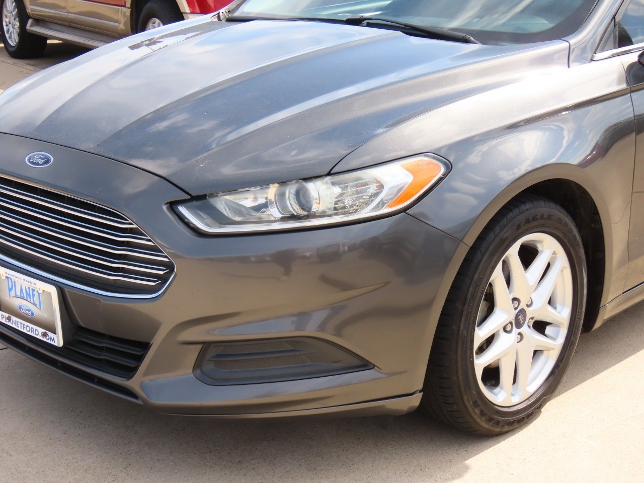 used 2015 Ford Fusion car, priced at $7,999