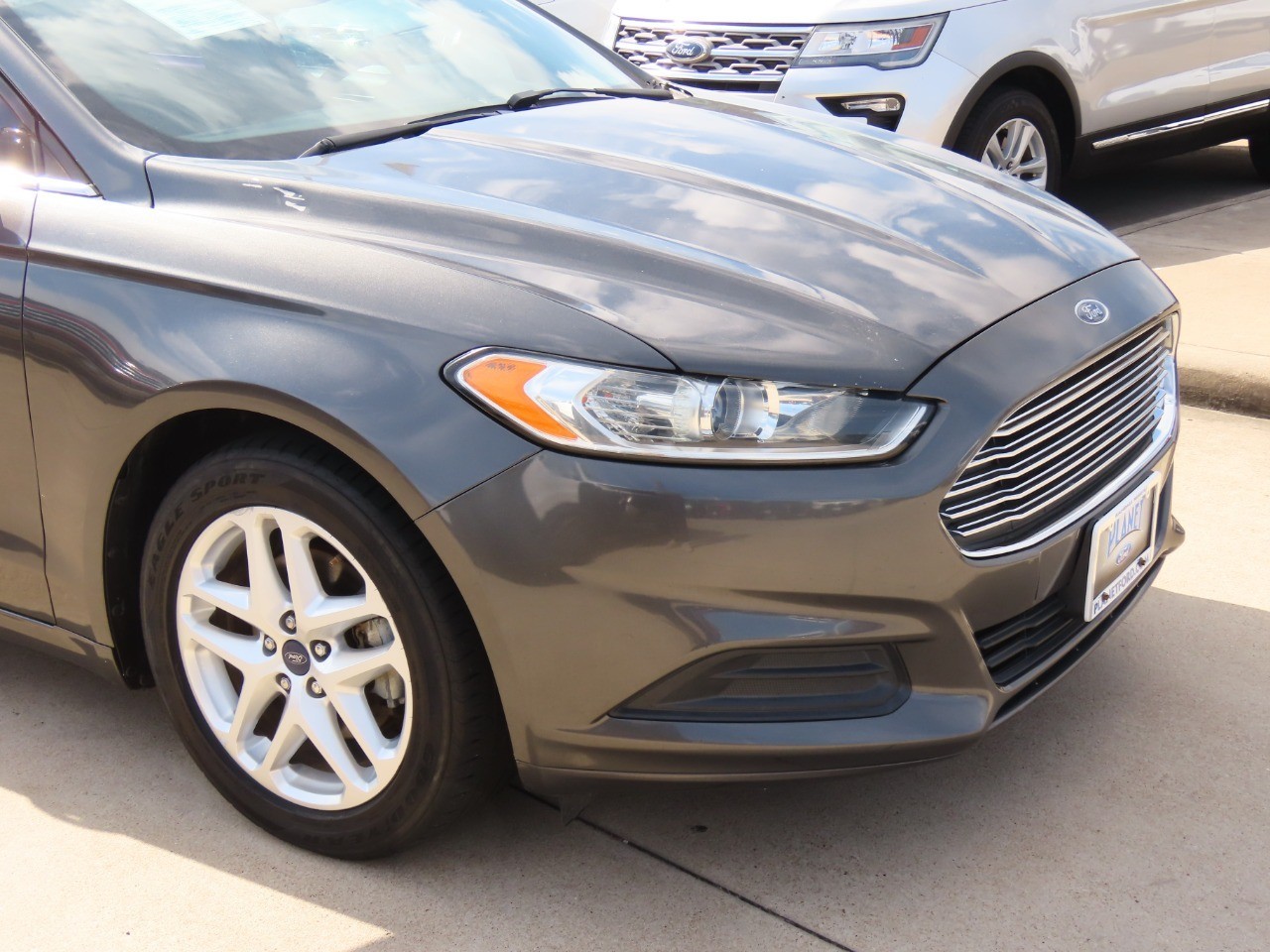used 2015 Ford Fusion car, priced at $7,999