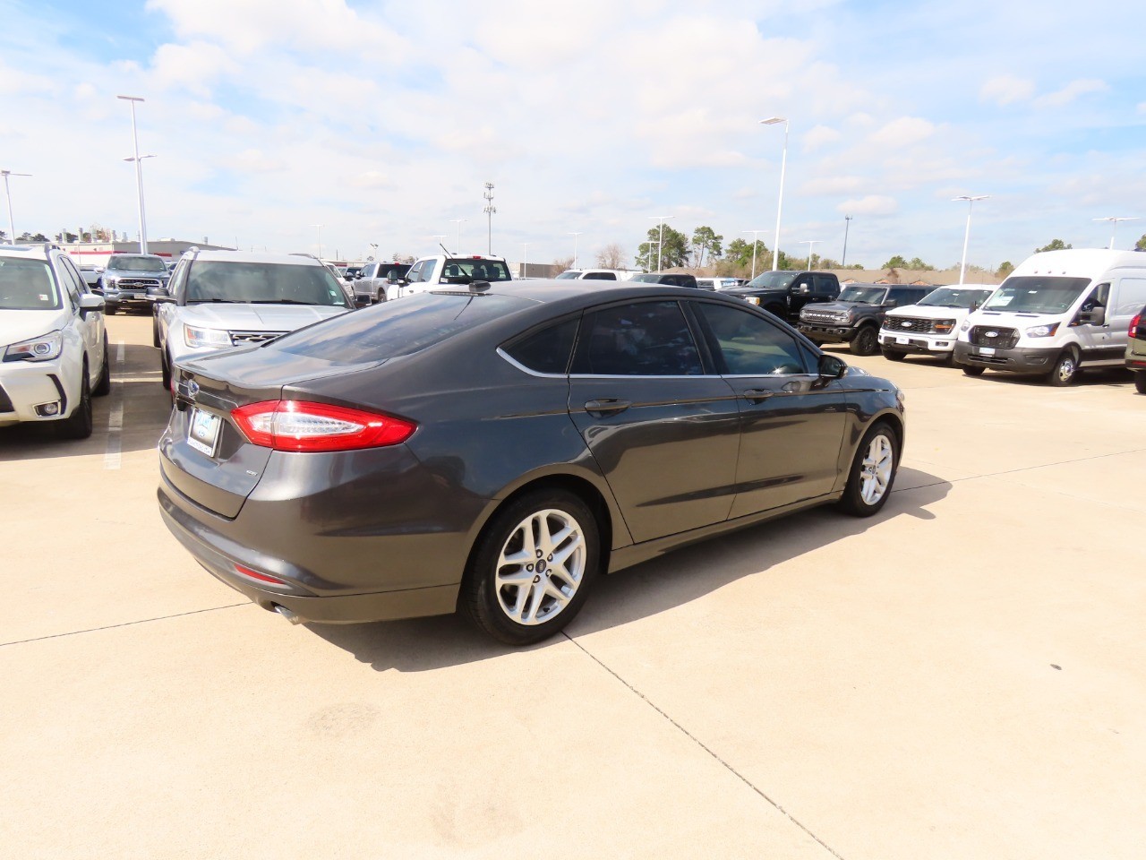 used 2015 Ford Fusion car, priced at $7,999