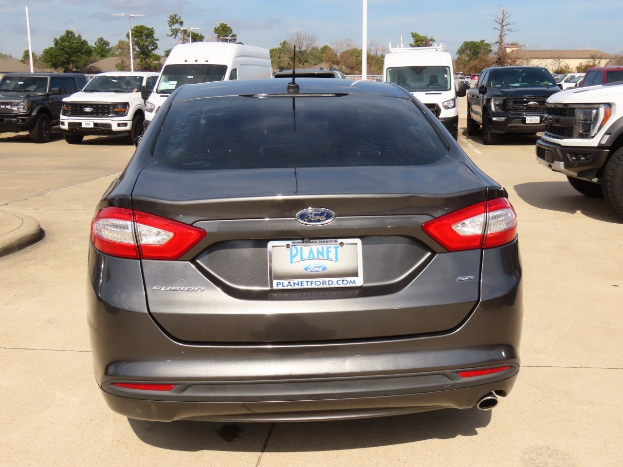 used 2015 Ford Fusion car, priced at $7,999