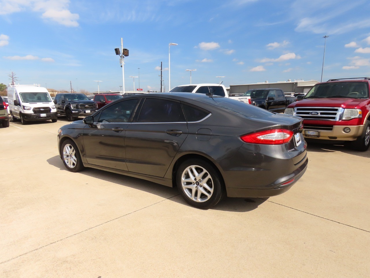 used 2015 Ford Fusion car, priced at $7,999