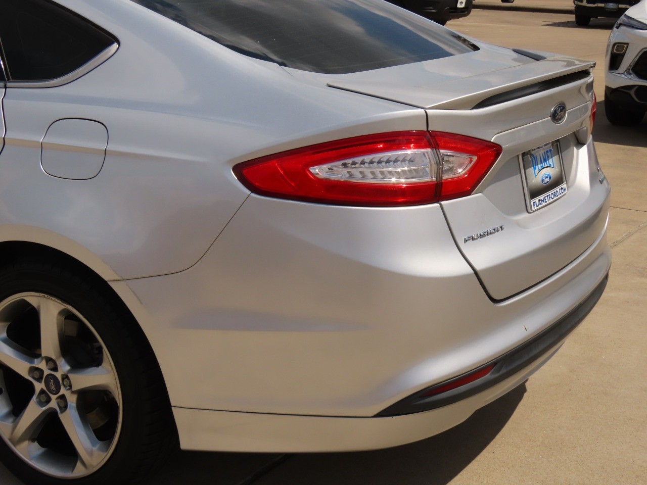 used 2013 Ford Fusion car, priced at $6,999